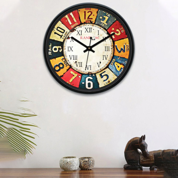 https://fashionrise.in/products/multicoloured-round-printed-analogue-wall-clock-30-cm